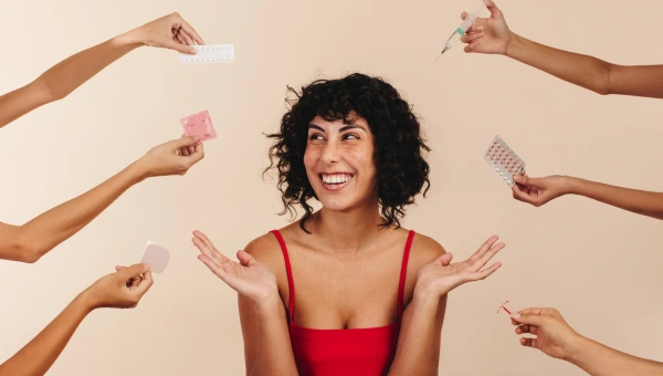 Happy woman surrounded by various hormone therapy options