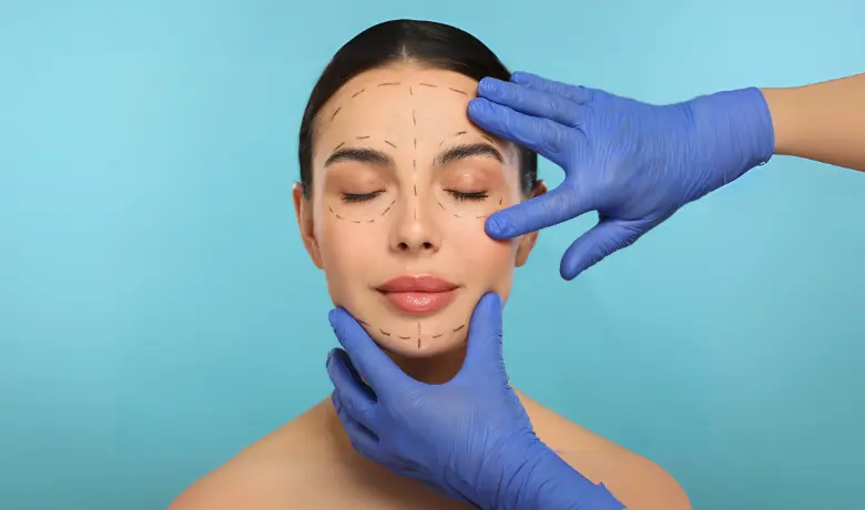 Doctor assessing woman's face with markings for facial rejuvenation